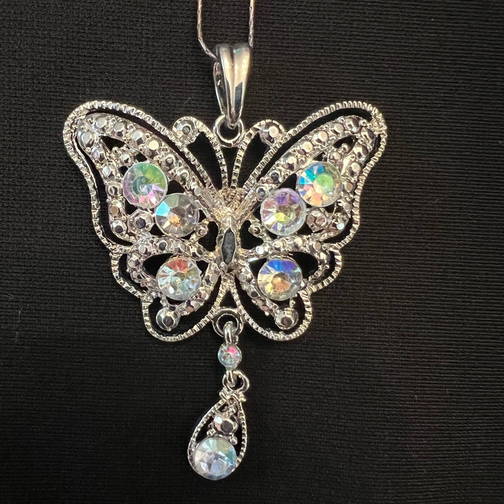 Beautiful fashion butterfly necklace with silver tones and iridescent stones
